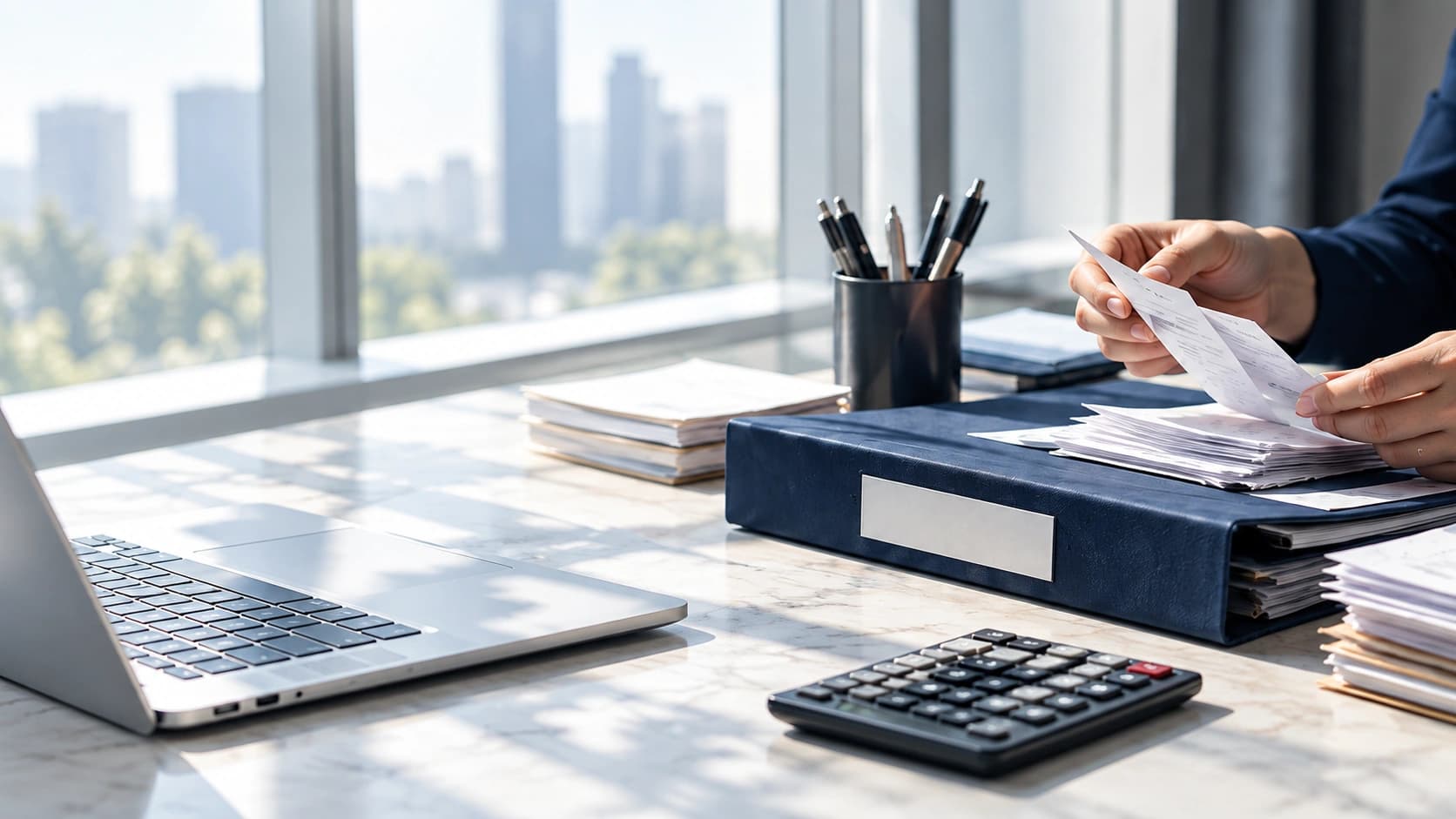 Bookkeeper organizing accounts payable ledgers